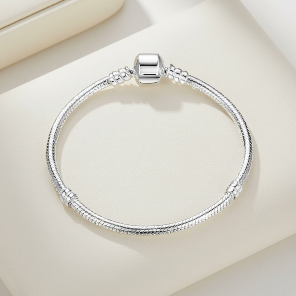 Barrel clasp snake chain bracelet with threaders on display