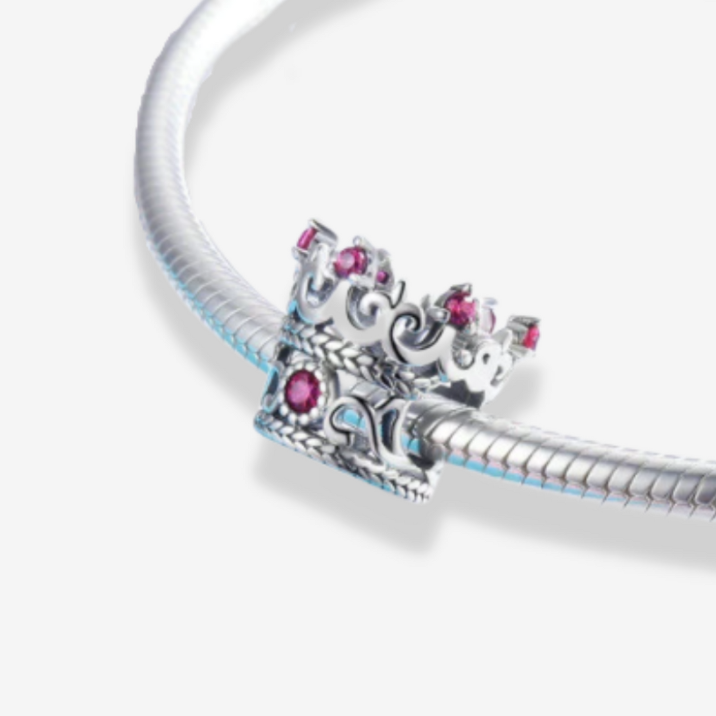 Crown Charm with Purple Jewels.