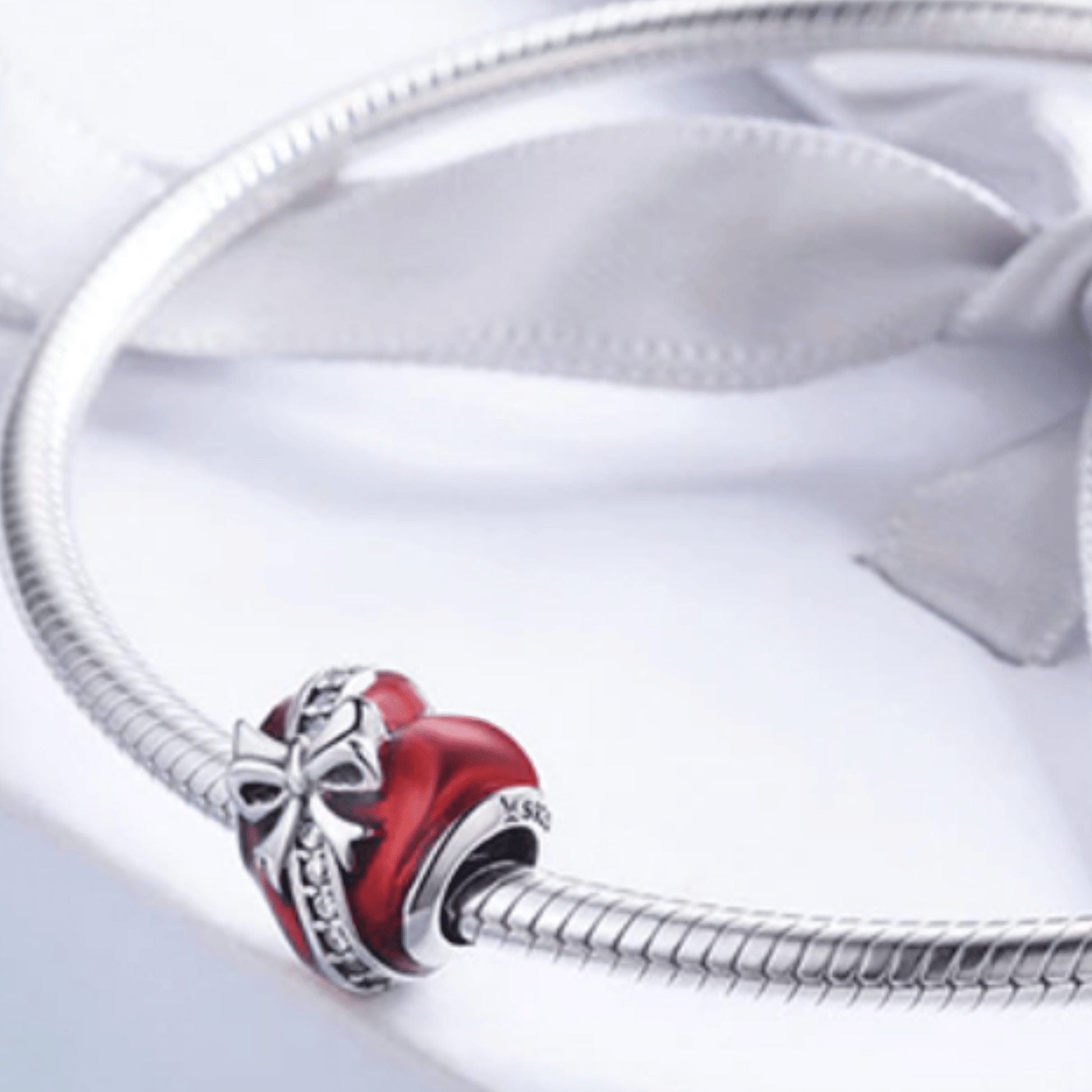 Red Love Heart Charm With Silver Bow and Sparkle Detail.